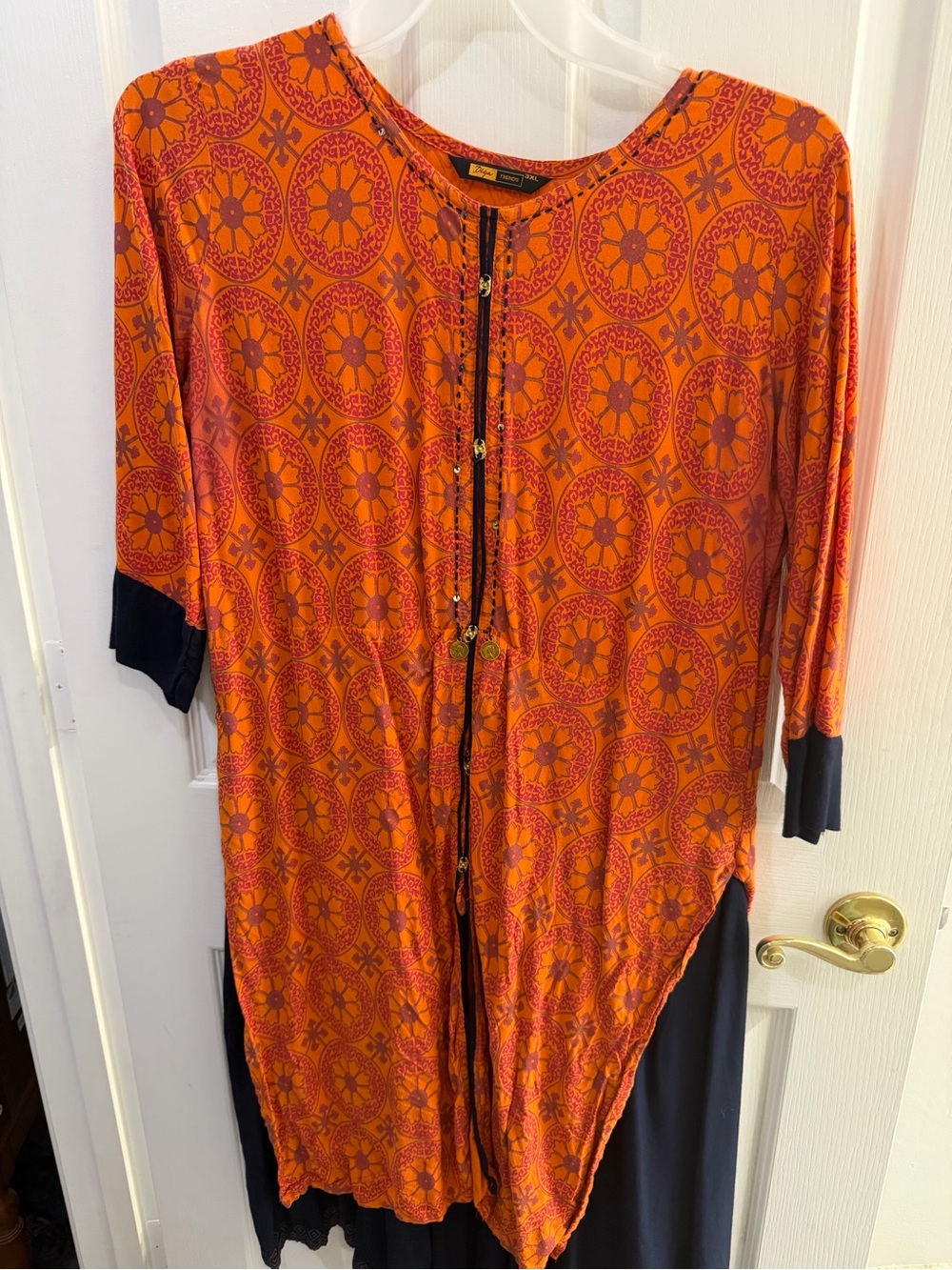 Printed Orange Long Sleeve Midi Dress with Black Trim